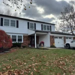 Ascend® Composite Plank Siding with Custom Trim & Black Gutters – Blue Bell, PA